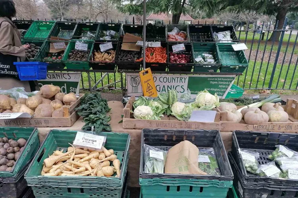 Organic vegetable stall at Victoria Park Market inside Victoria Park, Hackney