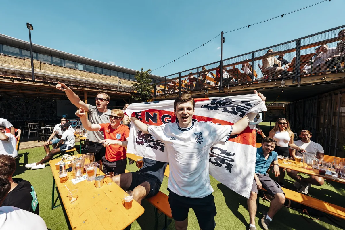 Vinegar Yard outdoor beer garden with the giant screen showing football
